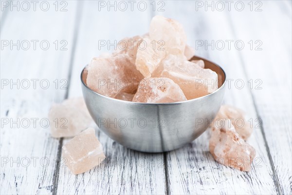 Portion of pink himalayan Salt (detailed close-up shot, selective focus)