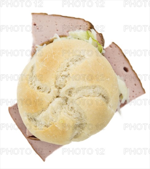 Portion of fresh made Leberkaese isolated on white background