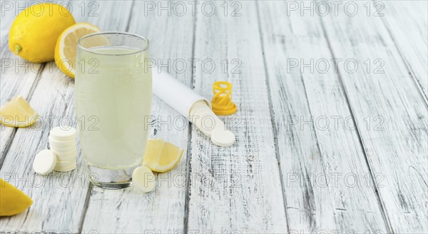 Vitamin C Tablets on a vintage background as detailed close-up shot, selective focus