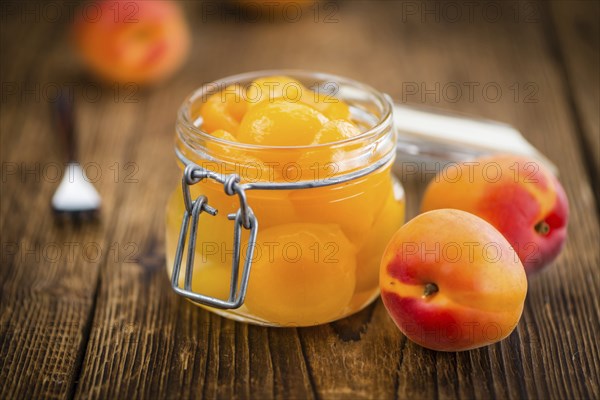 Portion of fresh pickled Apricots (close-up shot, selective focus)