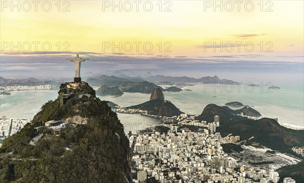 Cristo Redentor statue in Rio de Janeiro (aerial shot made from a helicopter) during a spectacular