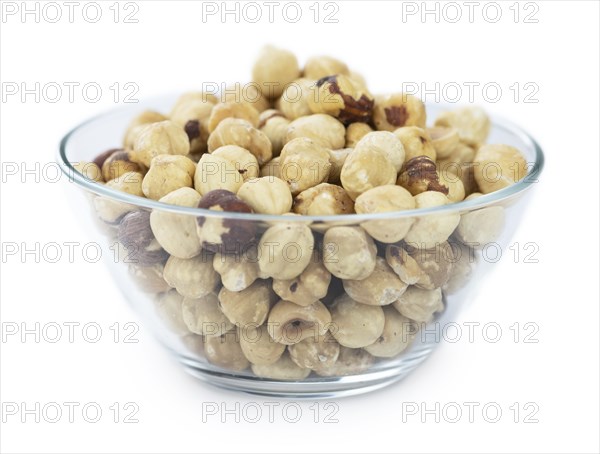 Peeled Hazelnuts isolated on white background (close up shot)