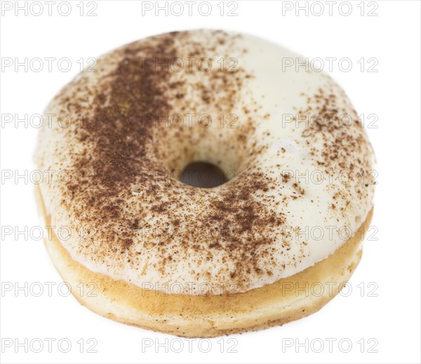Some fresh made Donuts isolated on white background (close-up shot)