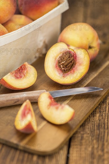 Portion of fresh Peaches close-up shot, selective focus