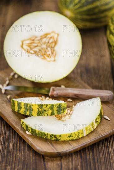 Portion of fresh Futuro Melons (close-up shot, selective focus)