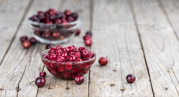 Portion of healthy Cranberries (preserved) (selective focus, close-up shot)
