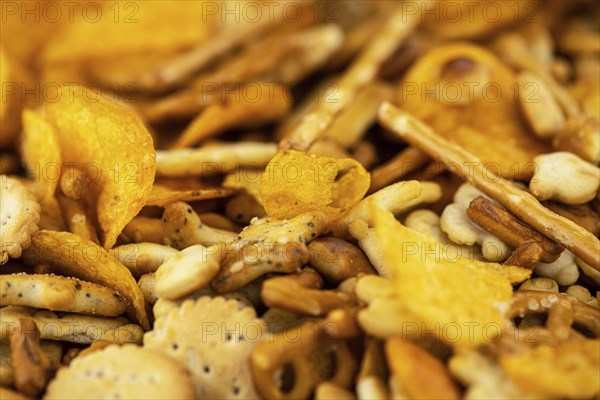 Portion of mixed Snacks (detailed close up shot, selective focus)