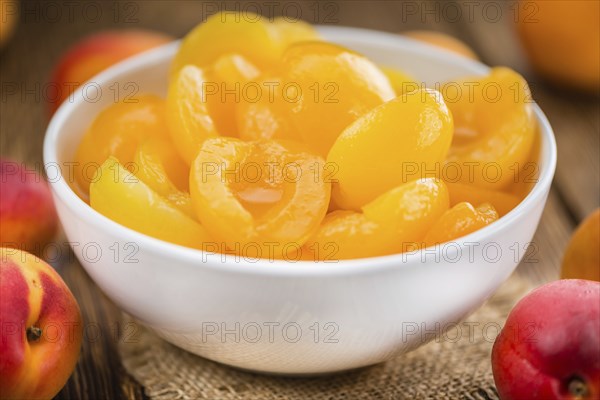 Portion of fresh pickled Apricots (close-up shot, selective focus)