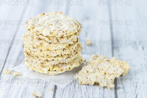 Some fresh made Corn Waffles on wooden background (selective focus)