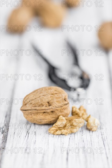 Walnuts on a vintage background as detailed close-up shot (selective focus)