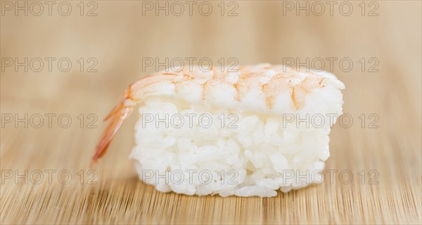 Portion of fresh made Sushi (detailed close-up shot, selective focus)