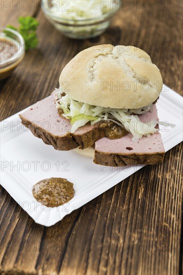 Homemade Meat Loaf on vintage background (selective focus, close-up shot)