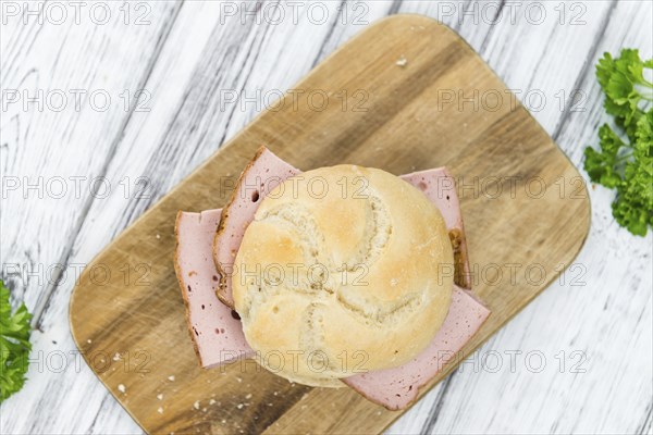 Meat Loaf on rustic wooden background (close-up shot)