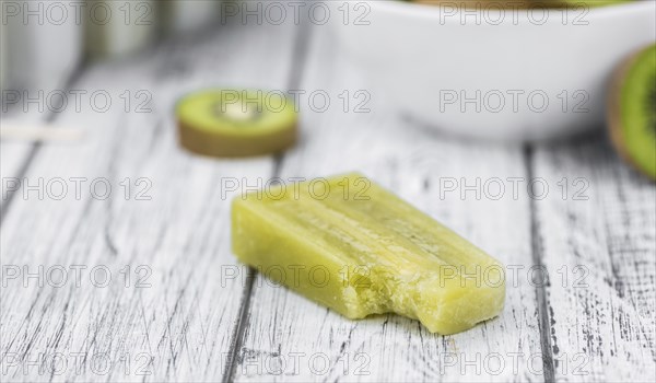 Kiwi Popsicles (fresh) as detailed close-up shot, selective focus)