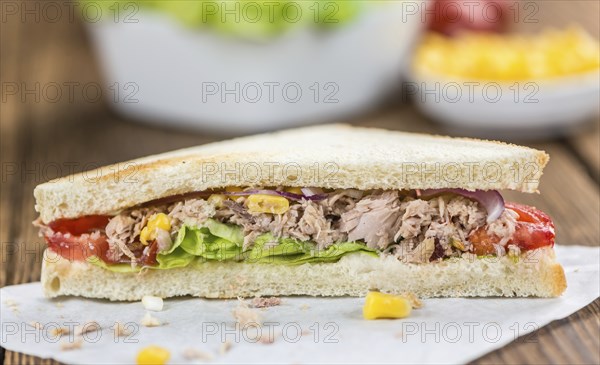 Tuna Sandwich (selective focus, close-up shot) on vintage background