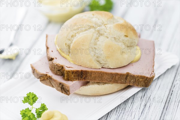 Homemade Meat Loaf on vintage background (selective focus, close-up shot)