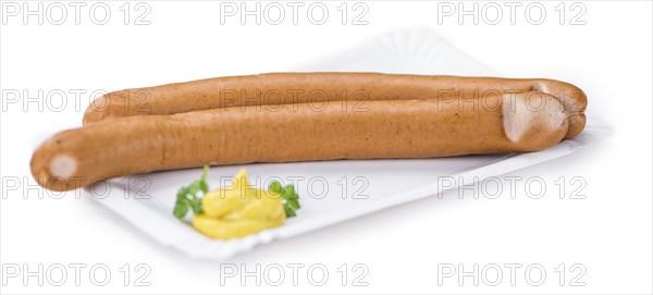 Portion of Wiener Sausages (as close-up shot) isolated on white background
