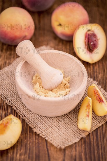 Portion of fresh Ground Peaches close-up shot, selective focus