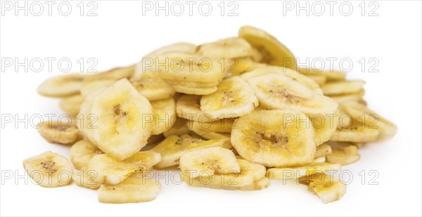 Fresh made Dried Banana Chips isolated on white background, close-up shot