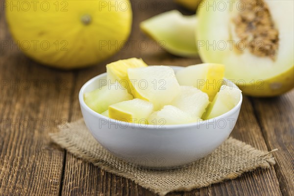 Portion of fresh made Honeydew Melon (close-up shot, selective focus)
