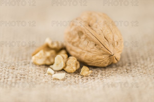 Portion of fresh Walnuts (close-up shot, selective focus)