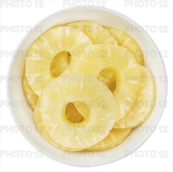 Fresh made Preserved Pineapple Rings isolated on white background, close-up shot