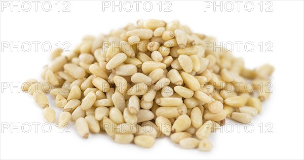 Pine Nuts isolated on white background (selective focus, close-up shot)