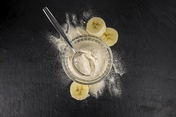 Portion of fresh Banana Powder close-up shot, selective focus