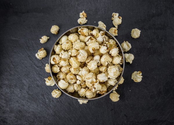 Some Popcorn on a vintage slate slab, selective focus