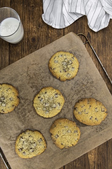 Chocolate Chip Cookies on an old wooden table (selective focus)