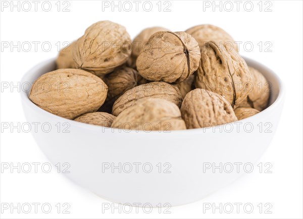 Walnuts isolated on white background (selective focus, close-up shot)