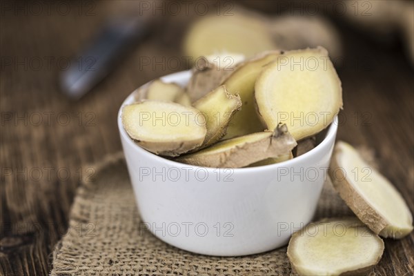 Some fresh Ginger Slices (selective focus, close-up shot)