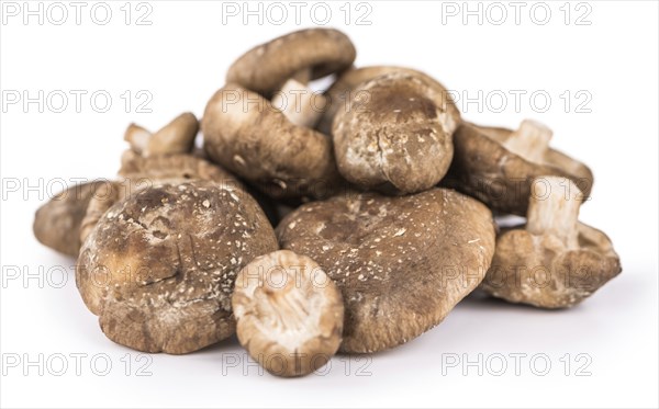 Portion of Shiitake mushrooms as detailed close-up shot isolated on white background