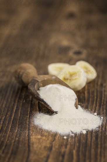 Portion of fresh Banana Powder close-up shot, selective focus