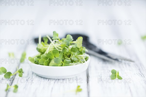 Cutted Cress on a vintage background as detailed close-up shot (selective focus)