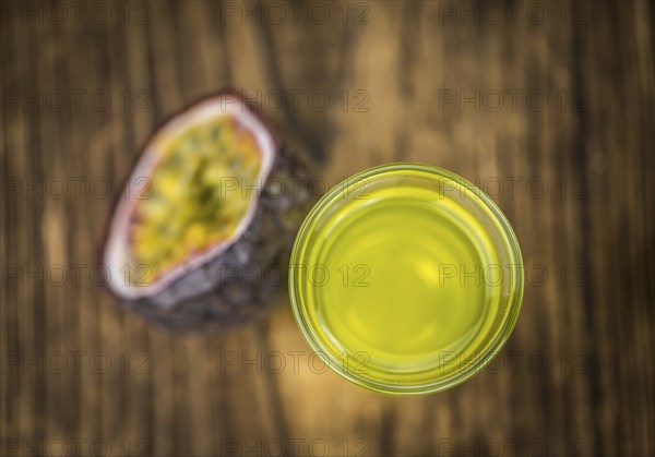 Passion Fruit Liqueur as detailed close-up shot, selective focus