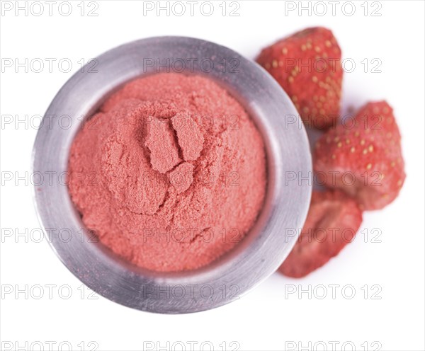 Strawberry powder isolated on white background, selective focus, close-up shot