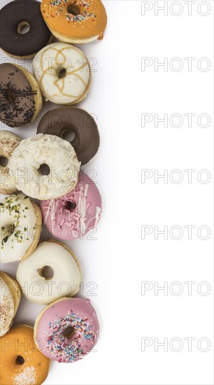 Fresh made Donuts isolated on white background (selective focus)