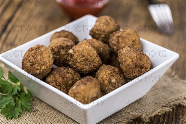 Portion of fresh homemade Meatballs (selective focus, close-up shot)