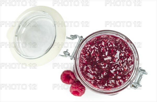 Raspberry Jam isolated on white background, selective focus, close-up shot