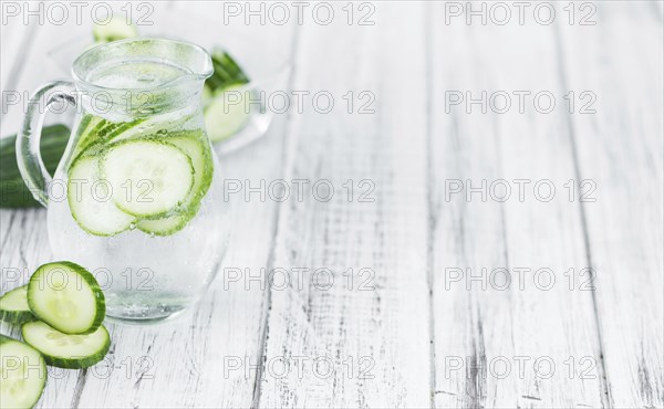 Homemade Cucumber Water on vintage background selective focus, close-up shot