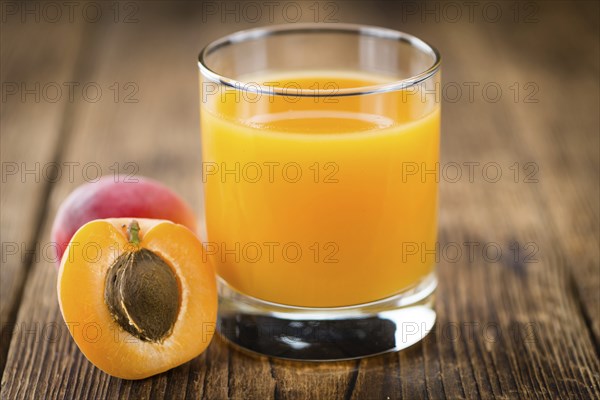 Some homemade Apricot Juice (selective focus) as detailed close-up shot