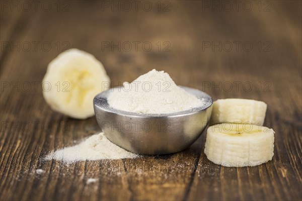 Banana Powder on a vintage background as detailed close-up shot, selective focus