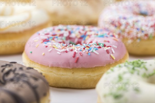Fresh made Donuts as detailed close-up shots (selective focus)
