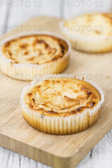 Homemade Cheesecake on vintage background (selective focus, close-up shot)