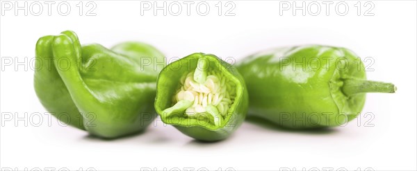 Portion of Raw Pimientos as detailed close-up shot isolated on white background