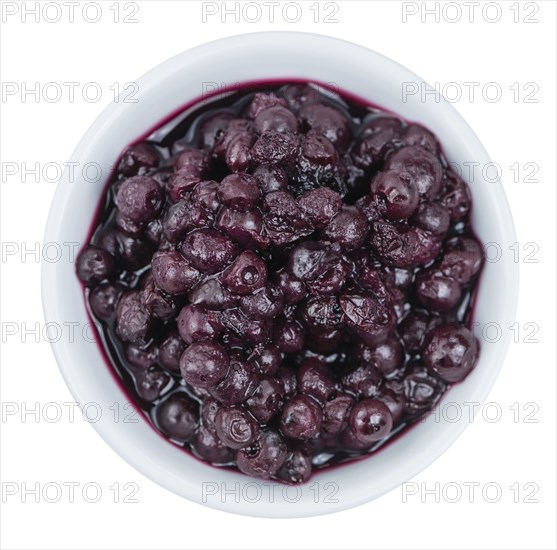 Portion of fresh made Preserved Blueberries isolated on white background