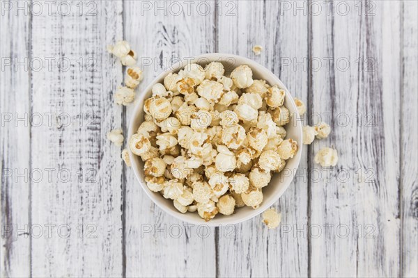 Some homemade Popcorn as detailed close-up shot, selective focus