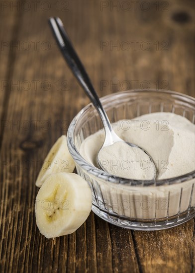 Portion of fresh Banana Powder close-up shot, selective focus