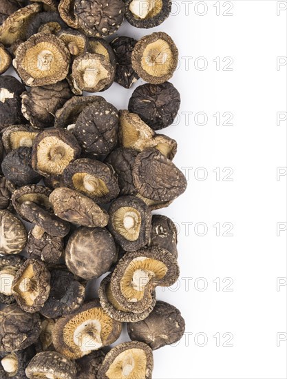 Portion of Dried Shiitake as detailed close-up shot isolated on white background